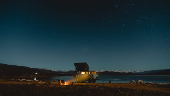 UAZ Buhanka camping at a lake