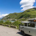 UAZ in front of reservoir