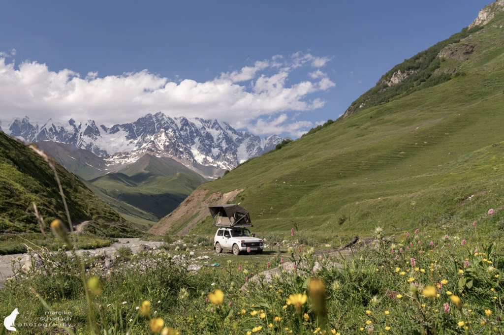 Lada Niva in front of mountains - Mareike S